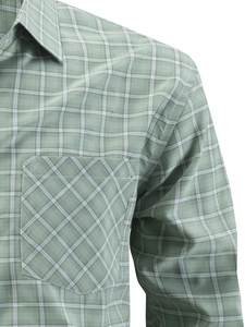 Detail of green plaid shirt featuring a chest pocket with diagonal pattern and classic collar