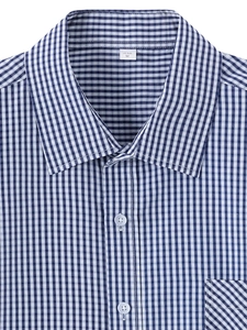 Close-up of classic blue and white gingham cotton shirt collar and button pocket