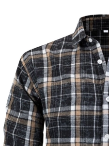 Detailed view of the checkered flannel shirt fabric with white buttons and a classic collar