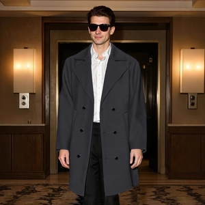 Men's double-breasted grey wool blend coat with peak lapels in business casual style
