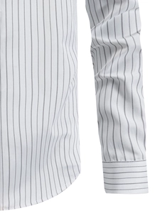 Detail of striped long sleeve shirt showing fabric texture and horizontal cuff pattern