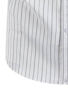 Detailed macro view of black vertical pinstripes and white button on long sleeve shirt