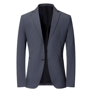 Classic grey business casual blazer with shoulder pads and a textured single-breasted design