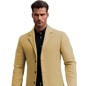 Men's slim fit camel lapel coat over a black shirt, formal business casual attire