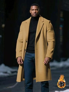 Close-up of men's camel wool overcoat showing thick quilted inner lining for winter warmth