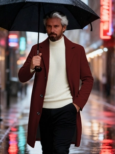 Men's stylish dark red wool trench coat with white turtleneck and black pants on a rainy street
