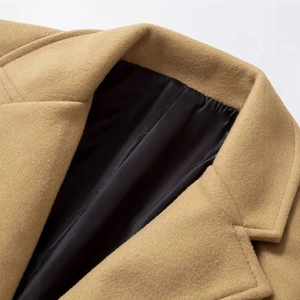 Classic men's khaki wool blend trench coat with black lining and notched lapel