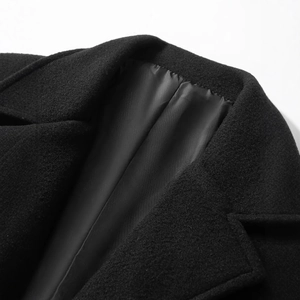 Classic black men's trench coat featuring premium wool texture and silk lining detail