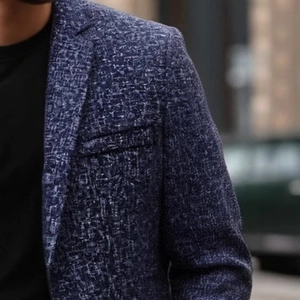 Men's casual blazer in navy blue with textured marble pattern and notched lapels
