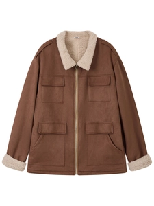 Close-up of brown suede workwear jacket featuring white faux shearling collar and pockets