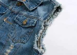 Slim fit light blue distressed denim vest with frayed edges and vintage copper buttons