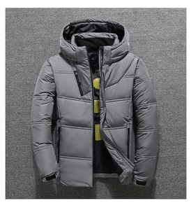 Detail view of winter grey hooded down jacket featuring yellow patterned black inner lining
