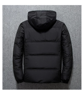 Back view of a black quilted puffer jacket with hooded design and windproof elastic cuffs