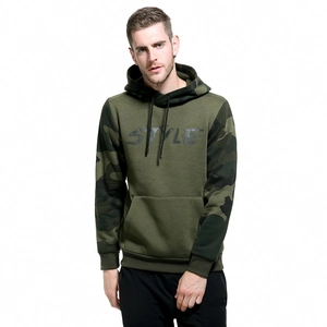 Detail view of military green hoodie featuring camouflage sleeves and STYLE chest print
