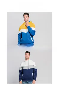 Detail view of contrast stitching and side pockets on men's color-block hooded sweatshirt