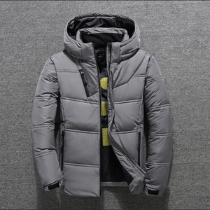 Men's grey hooded down jacket with quilted texture and bright yellow patterned lining