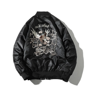Detail of the high-quality eagle embroidery on the back of this black satin bomber jacket