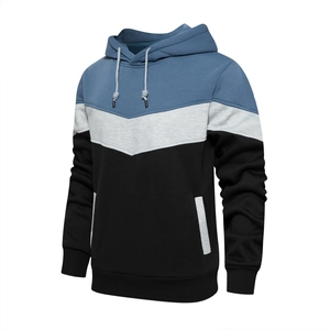 Detail of hooded sweatshirt showing the blue, grey, and black color-block design