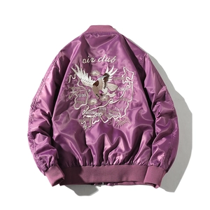 Detailed back view of purple satin bomber jacket with eagle and map embroidery
