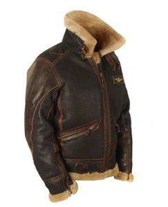 Detail view of brown B-3 aviator jacket with wings badge and warm fleece lapel collar