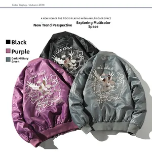 Detailed embroidery on back of satin MA1 pilot bomber jackets in multiple colors