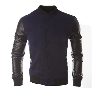 Detail of contrast varsity jacket showing black faux leather sleeves and ribbed cuffs