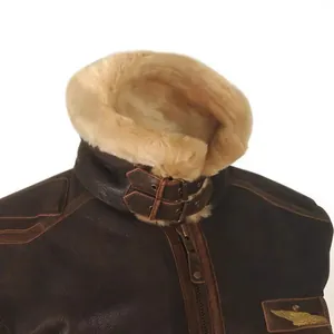 Men's brown leather bomber jacket with faux shearling collar and wing embroidery