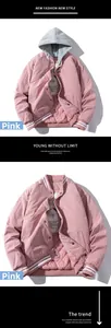 Pink men's bomber jacket featuring quilted thermal lining and grey drawstring hood