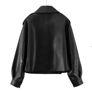Back view of a cropped black leather jacket featuring loose lantern sleeves and turn-down collar
