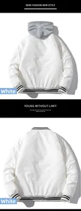 Close-up of white bomber jacket with black and white striped ribbing and detachable hood