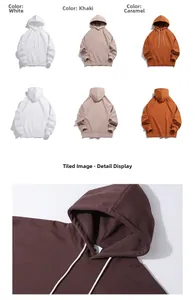 Vues détaillées de la capuche à cordon et des poignets côtelés sur ce sweat à capuche