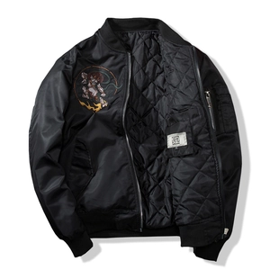 Black Sukajan bomber jacket featuring Japanese style embroidery and diamond quilted lining