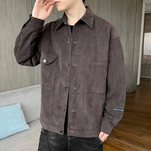 Men's dark brown corduroy jacket with chest pockets and sleeve graphic for casual autumn style