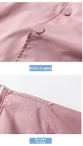 Detail view of pink baseball jacket showing matte buttons and reinforced shoulder stitching
