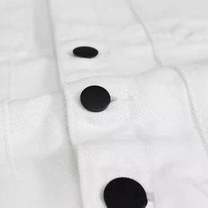 Slim fit white denim vest for men featuring black buttons and twill texture details