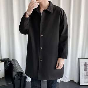 Men's stylish black mid-length trench coat with a classic lapel and casual Korean fit