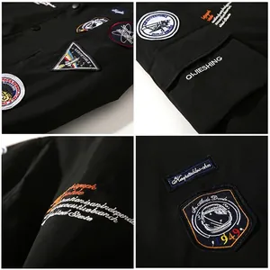 Black MA1 bomber jacket with detailed aviation embroidery and tactical flight patches