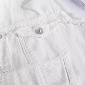 Slim fit white denim vest for men featuring distressed frayed edges and metal buttons
