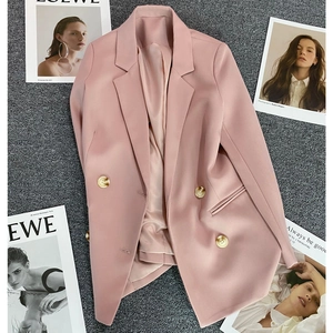 Chic oversized pink blazer for women with double-breasted buttons and peaked lapels