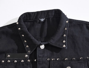 Men's black denim vest with punk silver rivets and heavy metal studs on the collar
