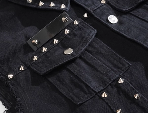 Men's slim fit black denim vest with silver cone studs and distressed frayed edges