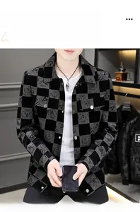 Detail of men's casual jacket with black and grey plaid pattern and star print typography