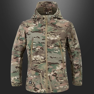 Close-up of tactical multicam softshell jacket featuring waterproof zippers and hood