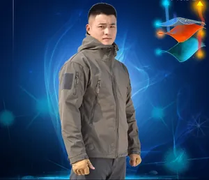 Tactical shark skin softshell jacket featuring waterproof chest pockets and hood detail