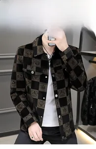 Detail of men's checkerboard jacket featuring turn-down collar and stylish star prints