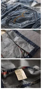 Detail of dark blue denim vest showing heavy wash texture, stitching and inner pocket