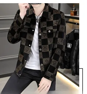 Detail of men's checkerboard jacket with star prints and classic metal buttons