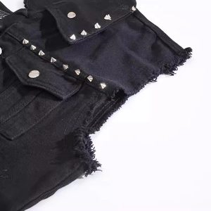 Men's black denim vest featuring silver metal studs and trendy frayed edges detail