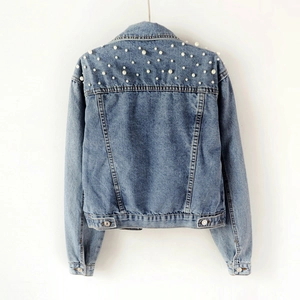 Women's light blue oversized denim jacket with white pearl beads on the back shoulder