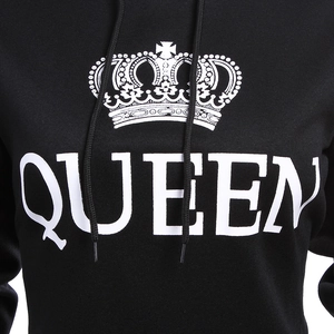 Macro detail of the white Queen text and crown print on the black cotton hoodie fabric